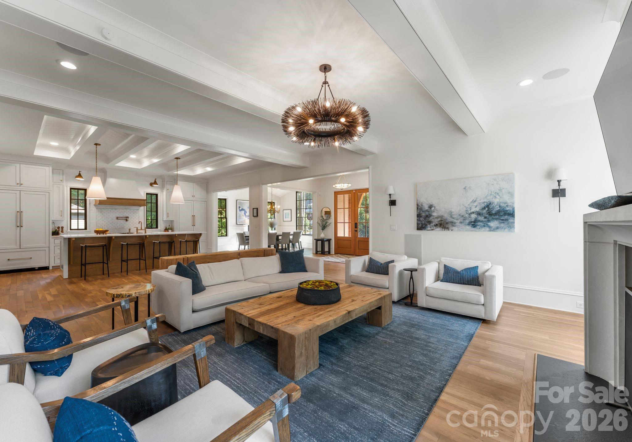 5625 Timber Lane Charlotte, NC 28270 - Photo 7 of 48 a living room with lots of furniture and a chandelier