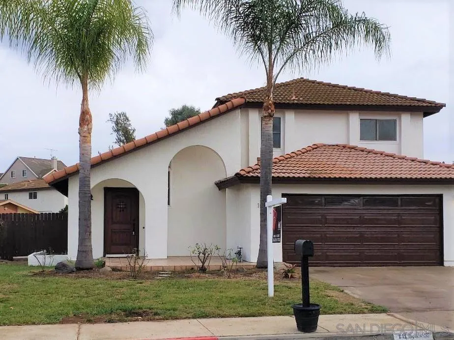 1859 Rees Road San Marcos, CA 92069 - Photo 1 of 11 a front view of a house with garden