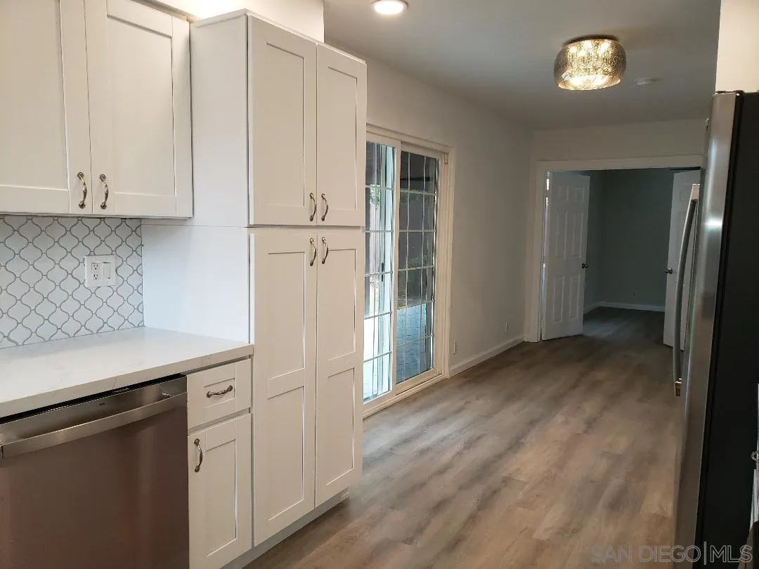 1859 Rees Road San Marcos, CA 92069 - Photo 2 of 11 a view of cabinets and wooden floor
