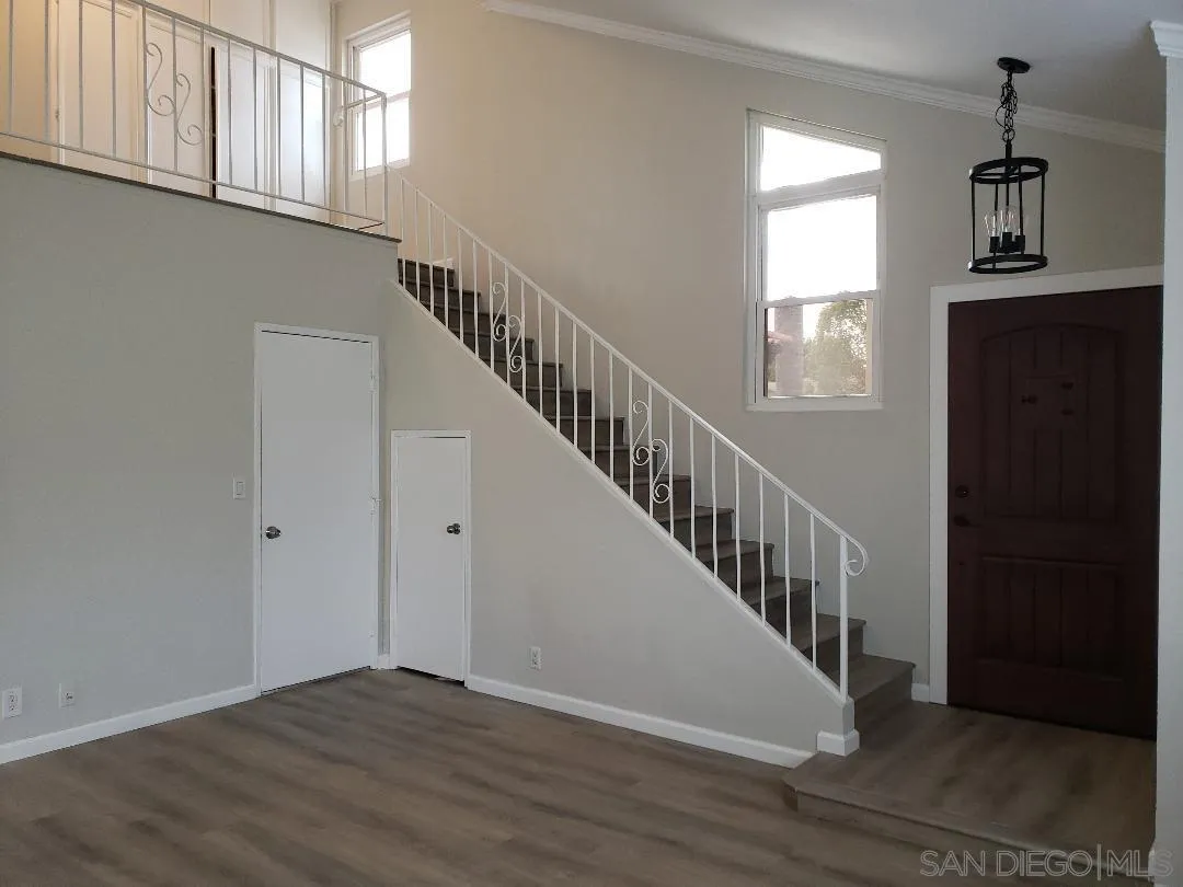 1859 Rees Road San Marcos, CA 92069 - Photo 7 of 11 a view of an entryway with wooden floor