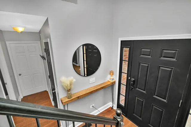 a living room with furniture fireplace and a flat screen tv