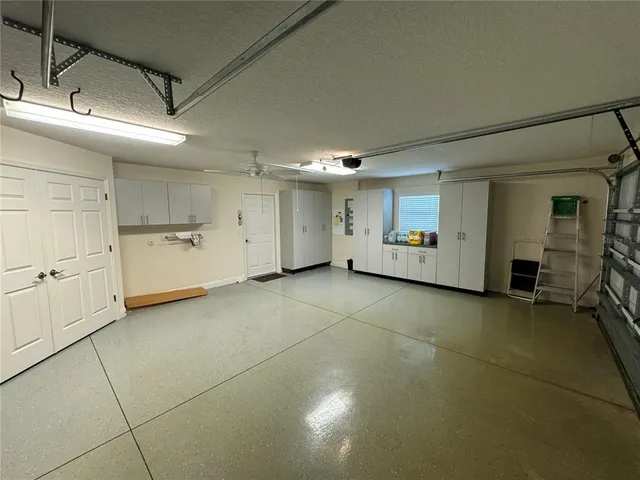 a view of a room with wooden floor and deck