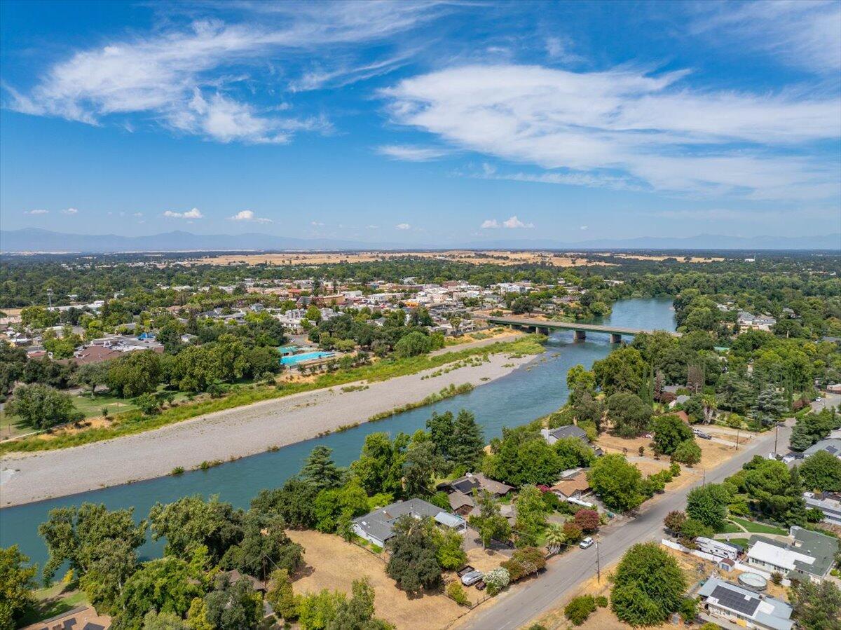 an aerial view of city and lake