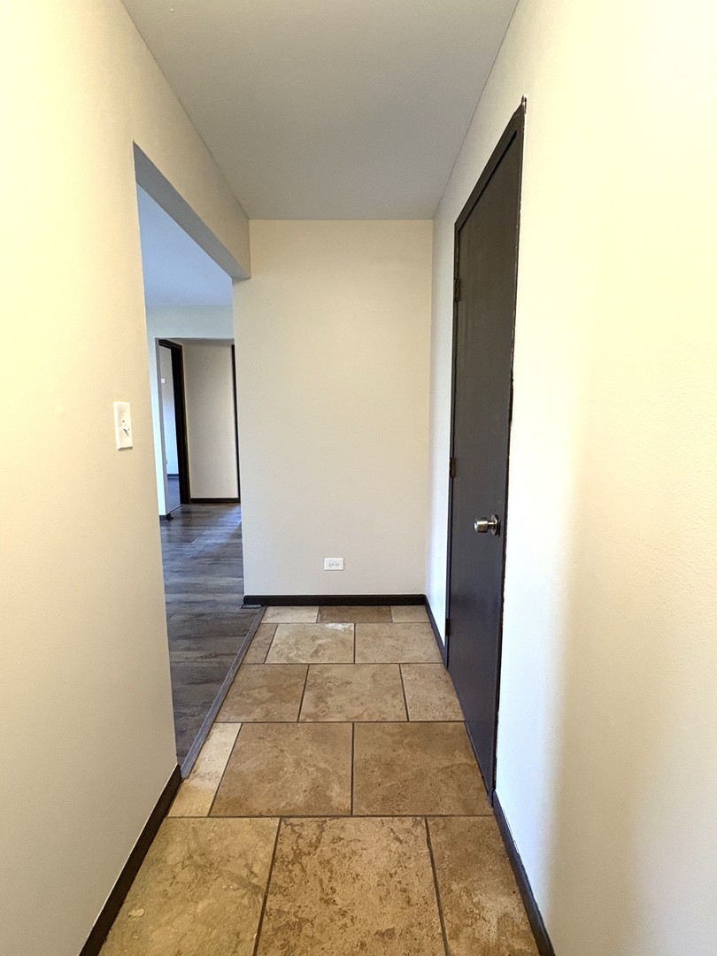 15805 Peggy Lane, Unit 9 Oak Forest, IL 60452 - Photo 2 of 20 a view of a hallway with wooden floor