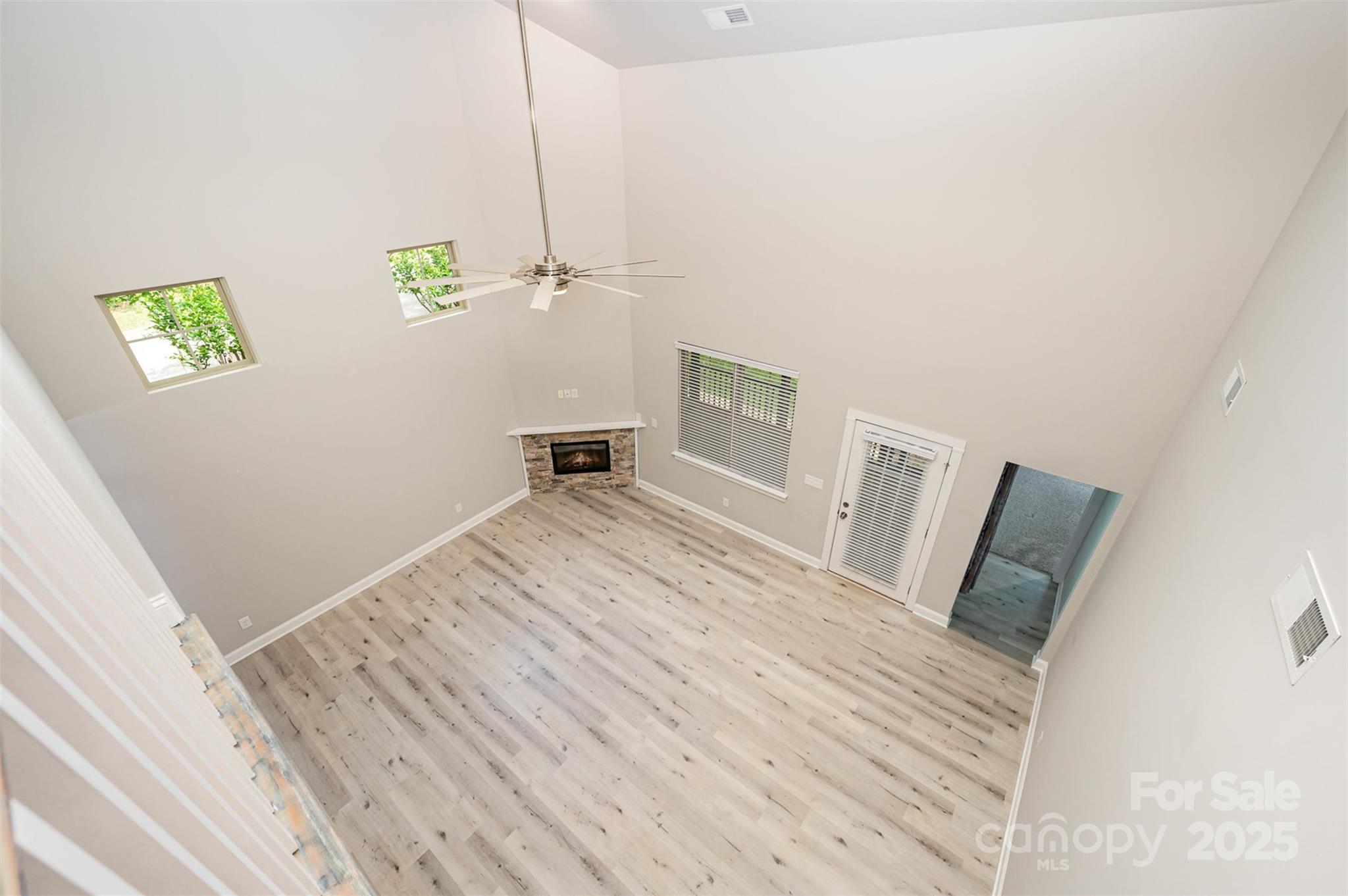 3004 Village Ridge Drive Gastonia, NC 28056 - Photo 12 of 35 a view of a bedroom with wooden floor and a window