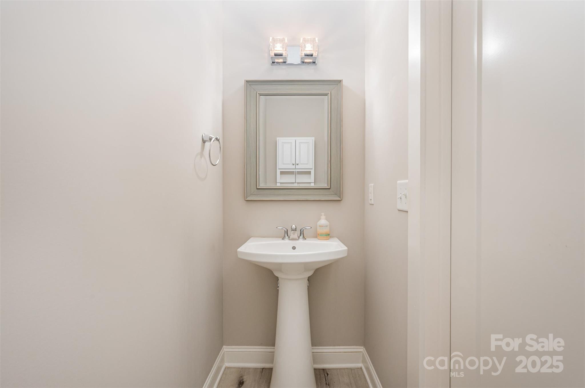 3004 Village Ridge Drive Gastonia, NC 28056 - Photo 13 of 35 a bathroom with a sink and a mirror