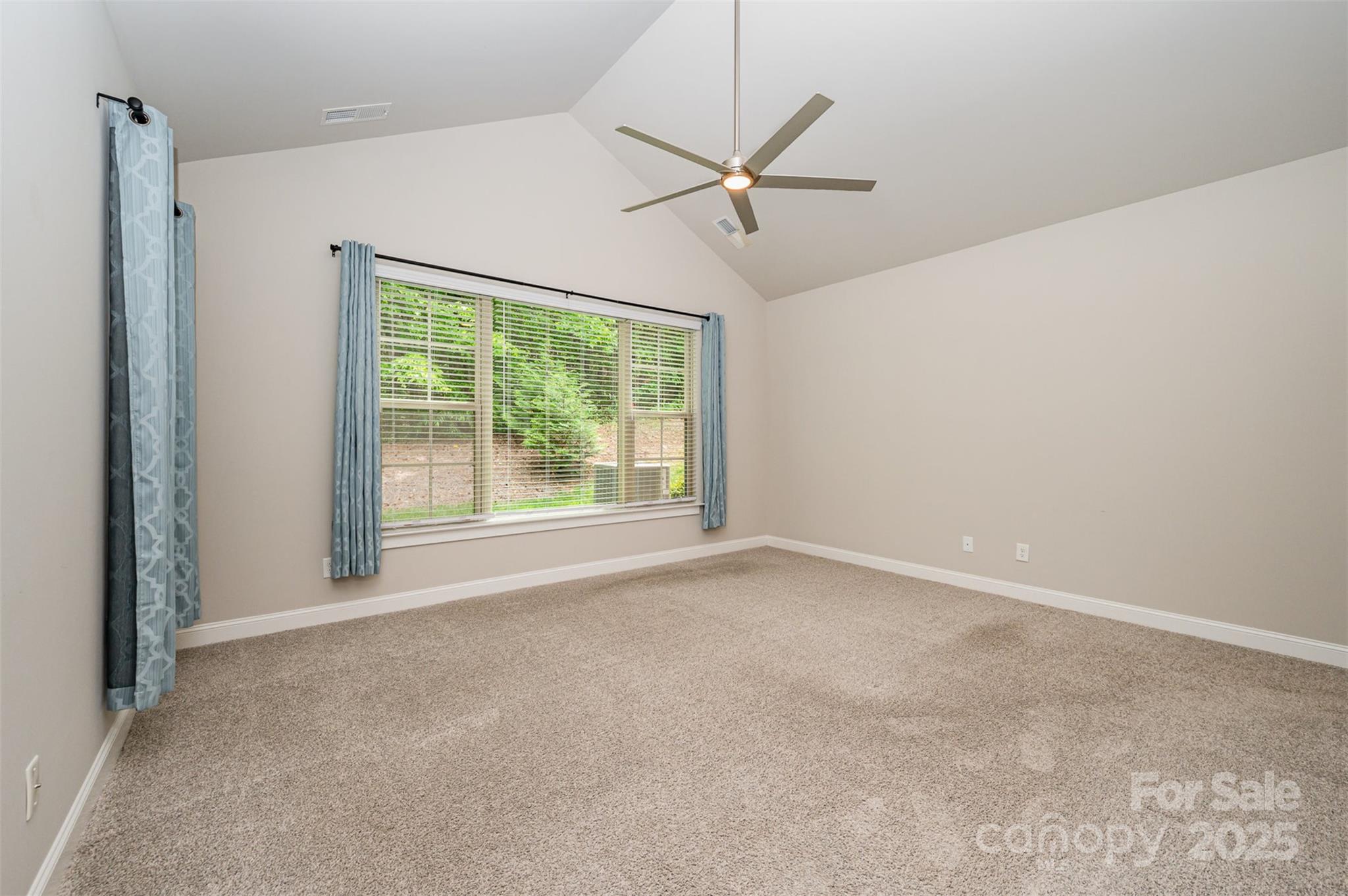 3004 Village Ridge Drive Gastonia, NC 28056 - Photo 16 of 35 a view of a livingroom with a ceiling fan and window