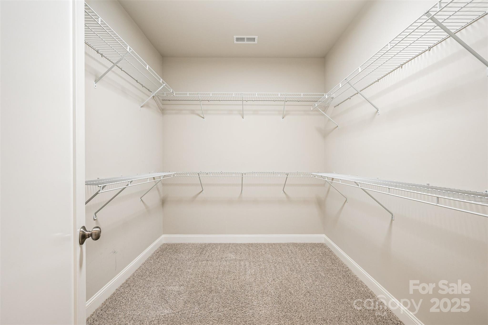3004 Village Ridge Drive Gastonia, NC 28056 - Photo 19 of 35 a view of a room with racks on the wall