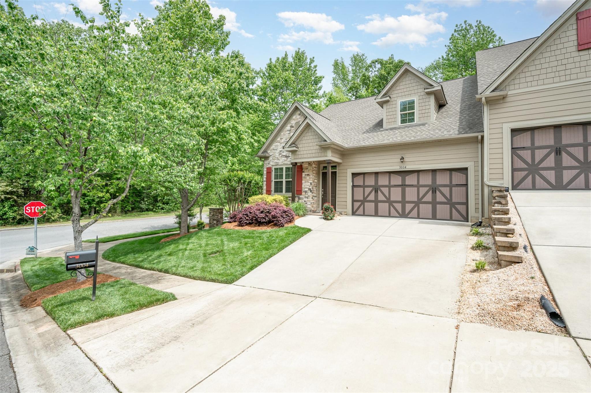 3004 Village Ridge Drive Gastonia, NC 28056 - Photo 2 of 35 a front view of a house with garden