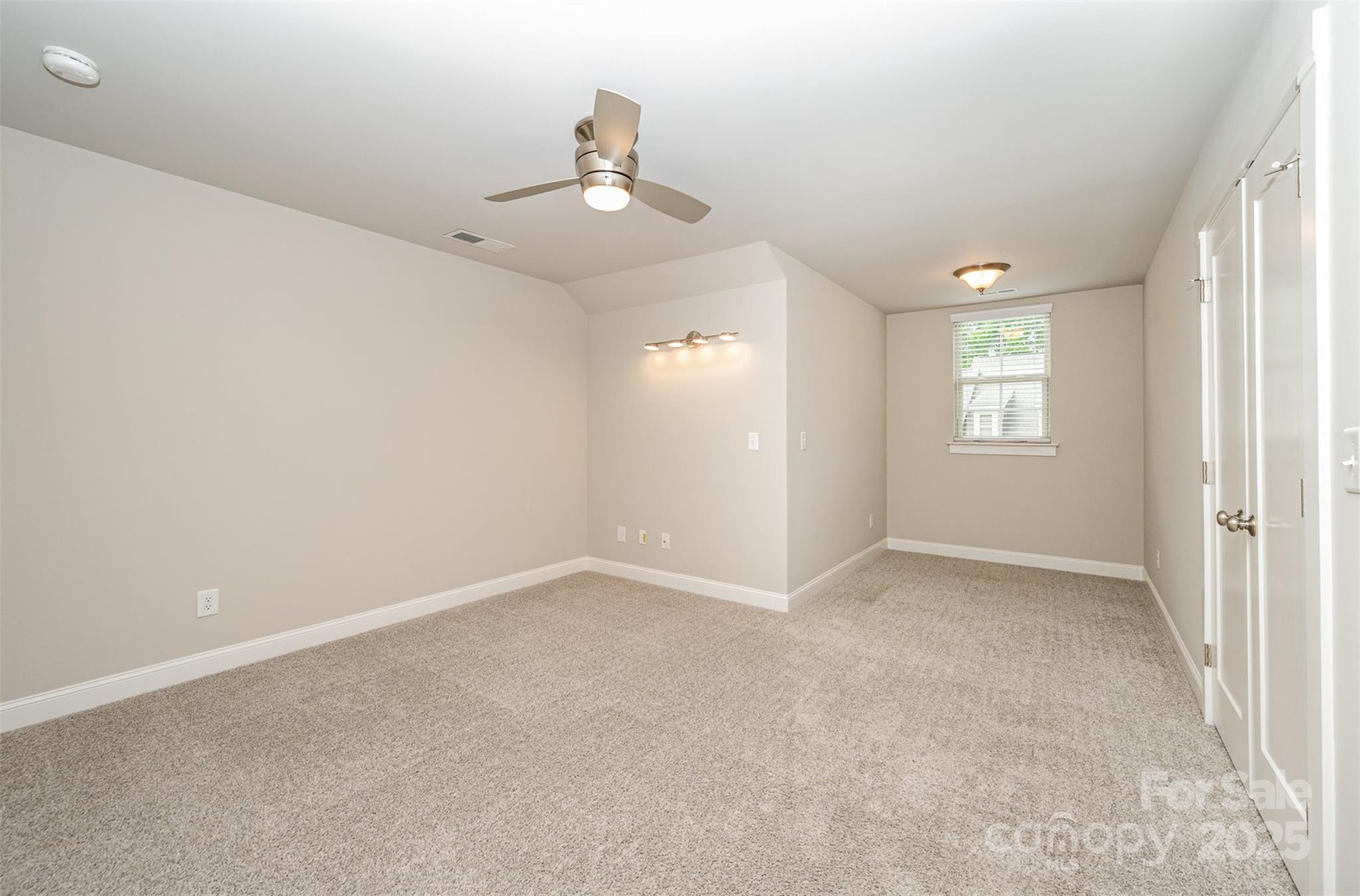 3004 Village Ridge Drive Gastonia, NC 28056 - Photo 22 of 35 an empty room with windows and closet