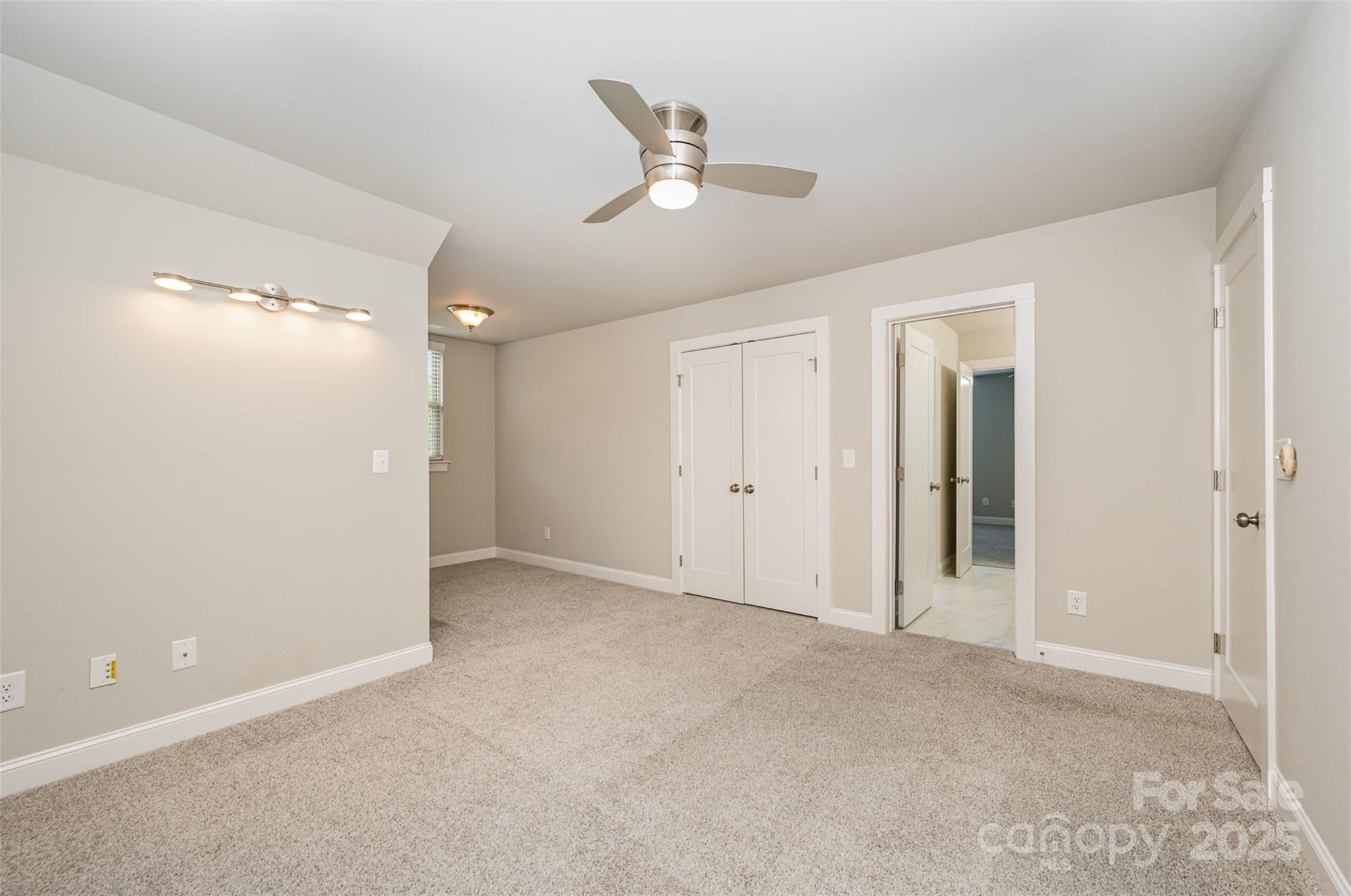 3004 Village Ridge Drive Gastonia, NC 28056 - Photo 23 of 35 a view of an empty room with a ceiling fan