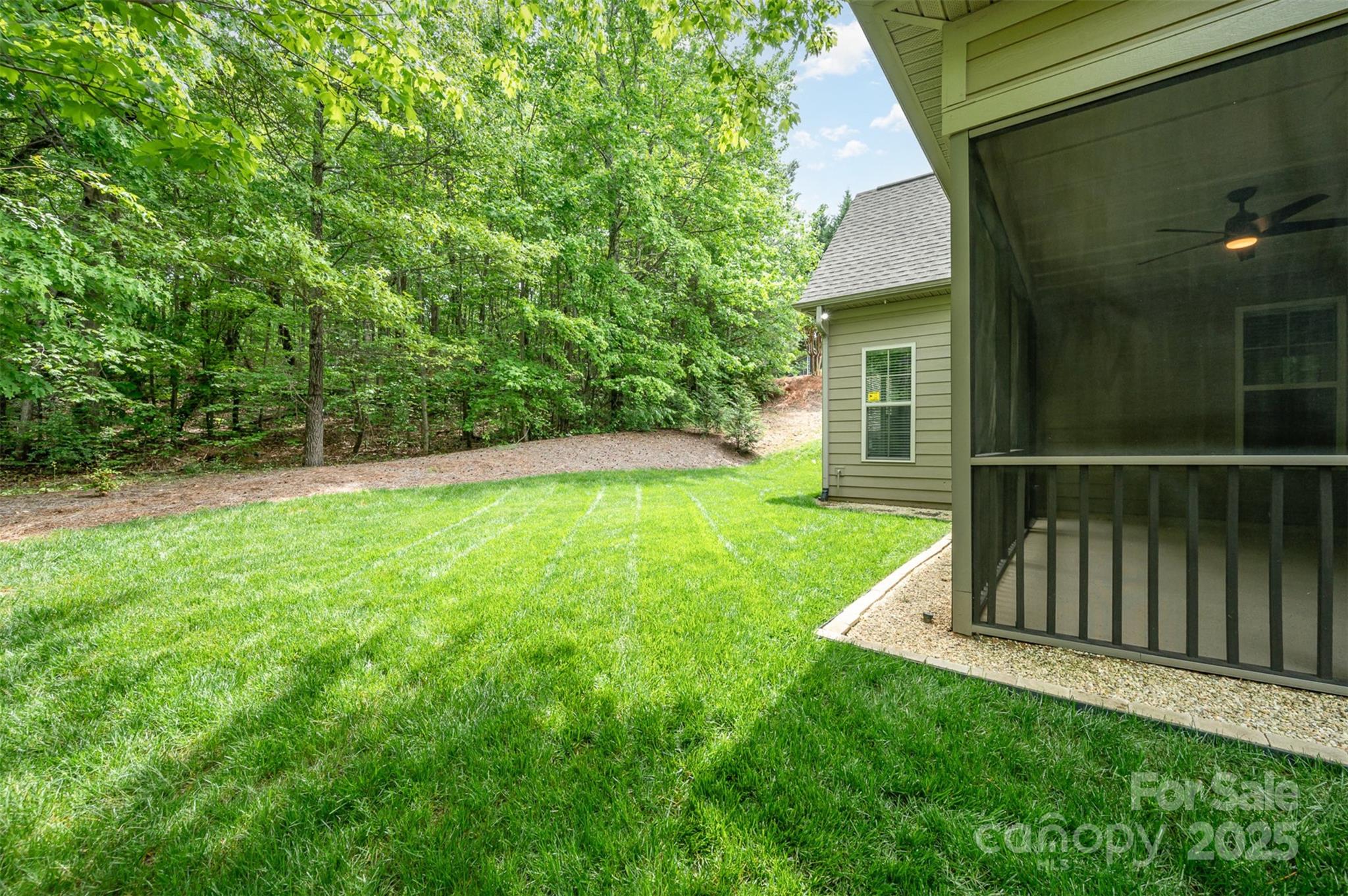 3004 Village Ridge Drive Gastonia, NC 28056 - Photo 28 of 35 a view of a backyard with a small cabin