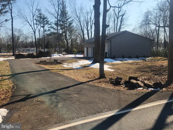 a view of a backyard of snow