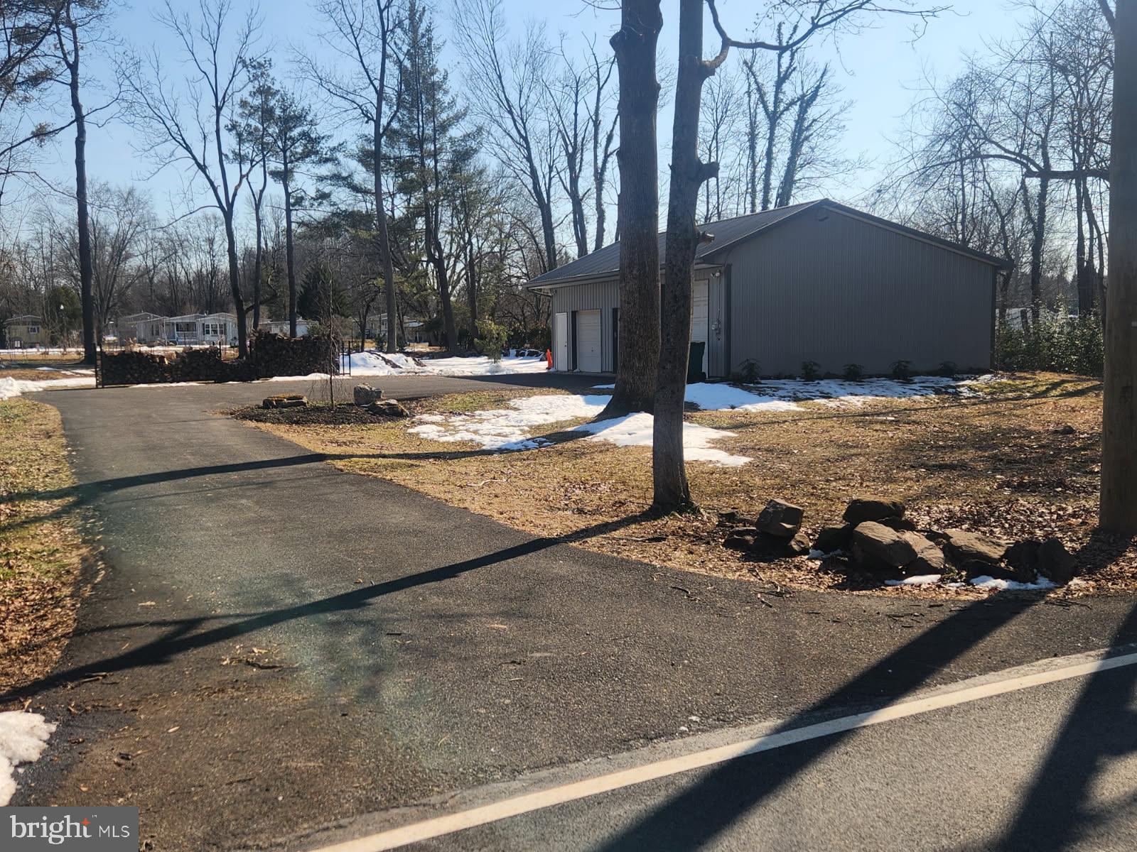 325 North Shady Retreat Road Doylestown, PA 18901 - Photo 3 of 5 a view of a backyard of snow