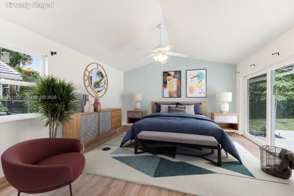 814 Heron Road Weston, FL 33326 - Photo 22 of 27 a bedroom with furniture and a large window