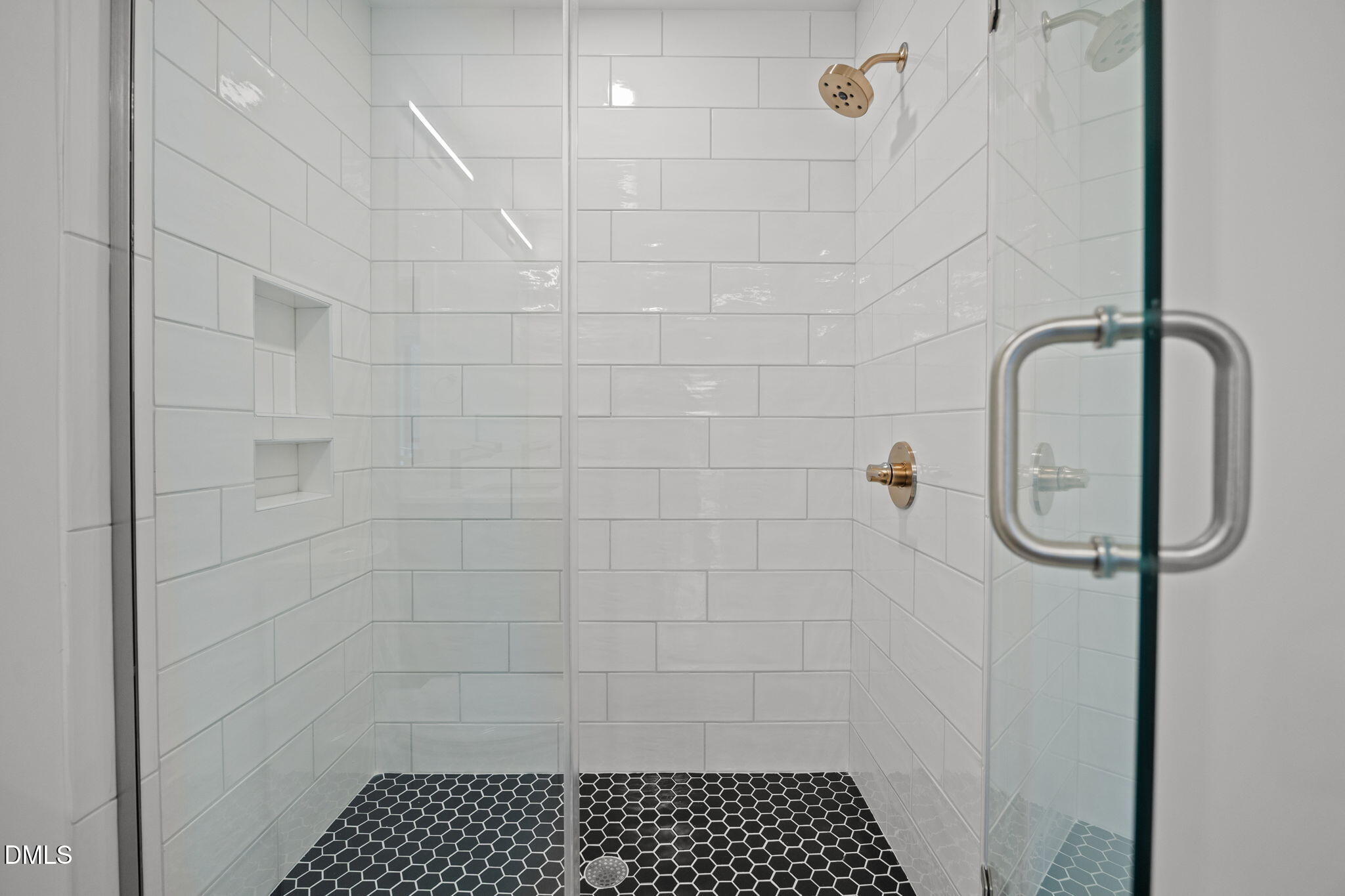 615 West Peace Street, Unit 307 Raleigh, NC 27605 - Photo 17 of 20 a bathroom with a shower