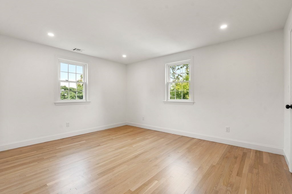 200 Hunting Road Needham, MA 02494 - Photo 18 of 31 wooden floor in an empty room with a window
