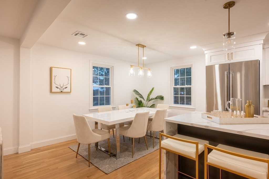 200 Hunting Road Needham, MA 02494 - Photo 5 of 31 a view of a dining room with furniture and window
