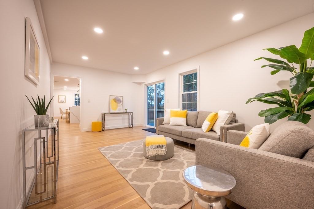 200 Hunting Road Needham, MA 02494 - Photo 8 of 31 a living room with furniture and a potted plant