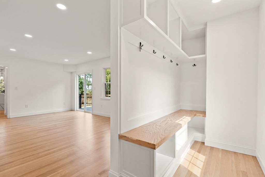 200 Hunting Road Needham, MA 02494 - Photo 9 of 31 a view of an empty room with wooden floor