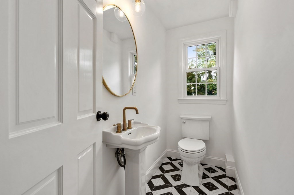 200 Hunting Road Needham, MA 02494 - Photo 10 of 31 a bathroom with a sink toilet and a mirror