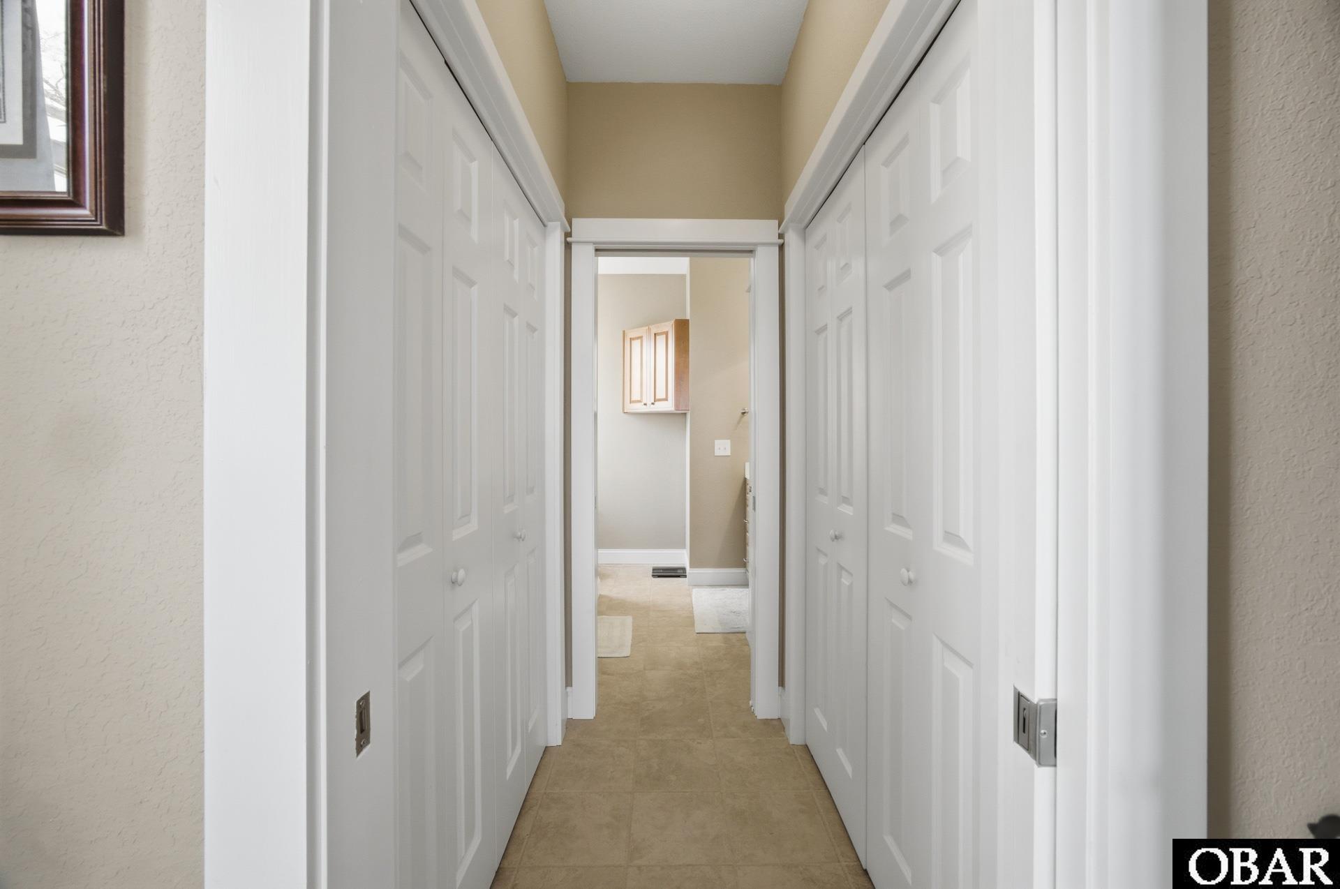 52 Cahoon Road Manns Harbor, NC 27953 - Photo 6 of 19 Master Closet Hallway
