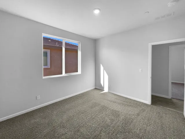 a view of an empty room with window