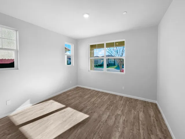 an empty room with windows