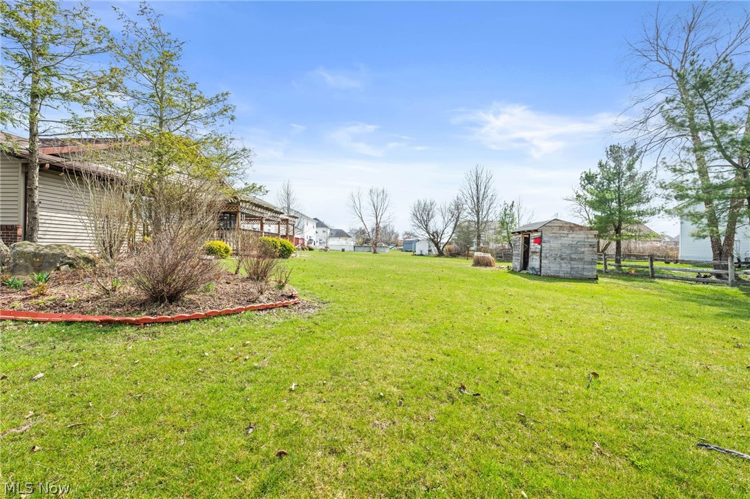 5352 Jaycox Road North Ridgeville, OH 44039 - Photo 24 of 27 Side view of backyard and shed