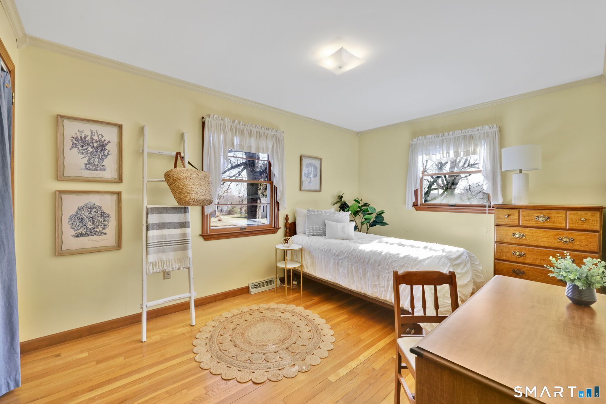 15 Johnson Road Wallingford, CT 06492 - Photo 16 of 37 a bed room with furniture and wooden floor