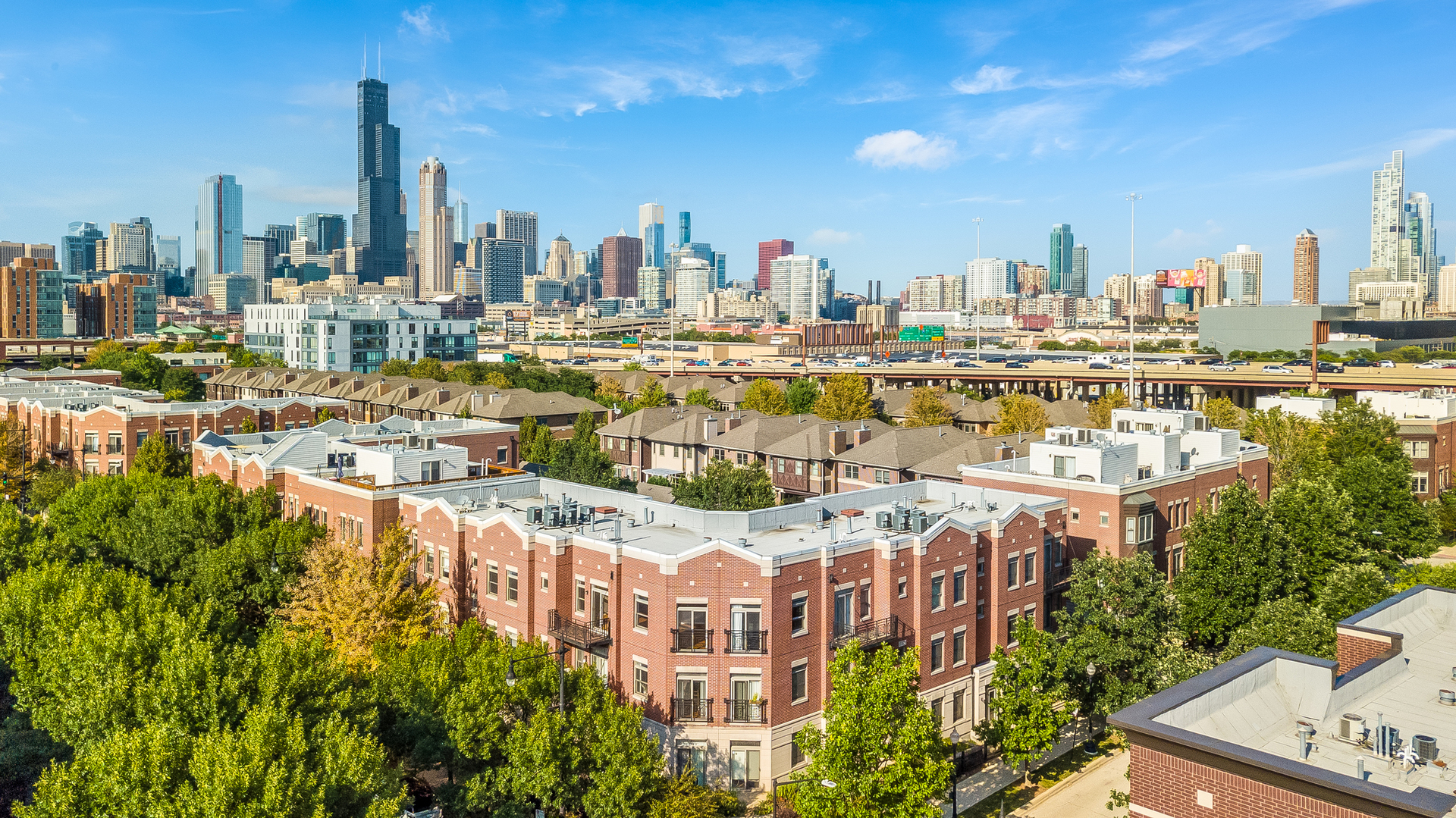 1461 South Halsted Street, Unit 3B Chicago, IL 60607 - Photo 2 of 21 a view of a city with tall buildings