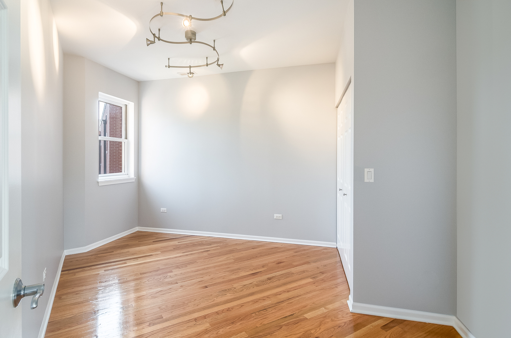 1461 South Halsted Street, Unit 3B Chicago, IL 60607 - Photo 12 of 21 a view of a chandelier in a room