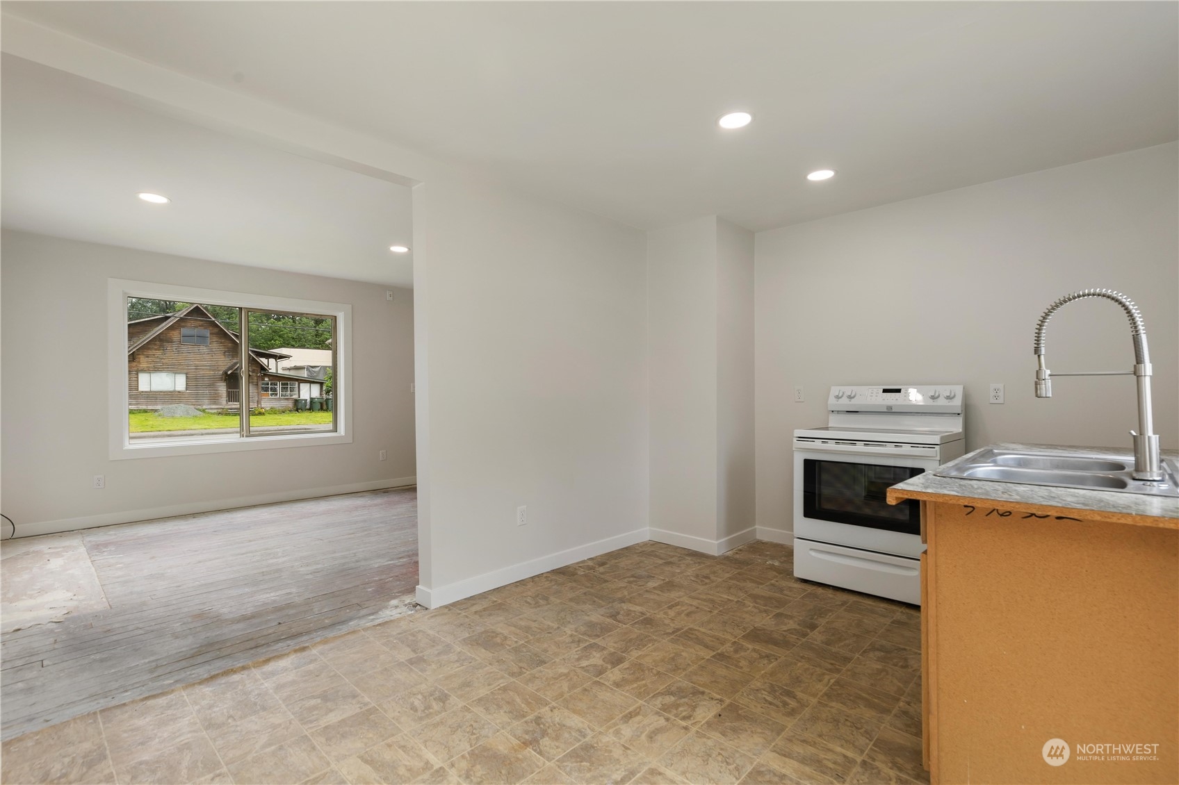 705 Main Street Sultan, WA 98294 - Photo 13 of 31 a view of a kitchen with appliances and cabinets