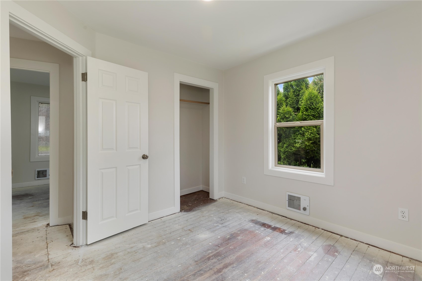 705 Main Street Sultan, WA 98294 - Photo 17 of 31 an empty room with windows and closet
