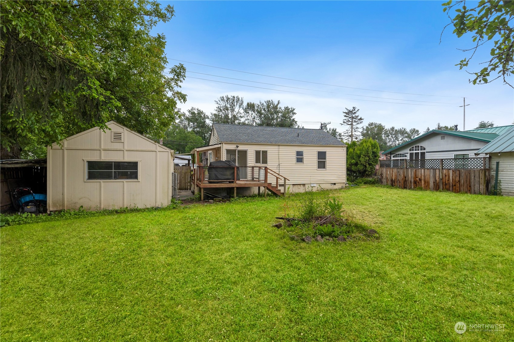 705 Main Street Sultan, WA 98294 - Photo 22 of 31 a front view of house with yard and green space