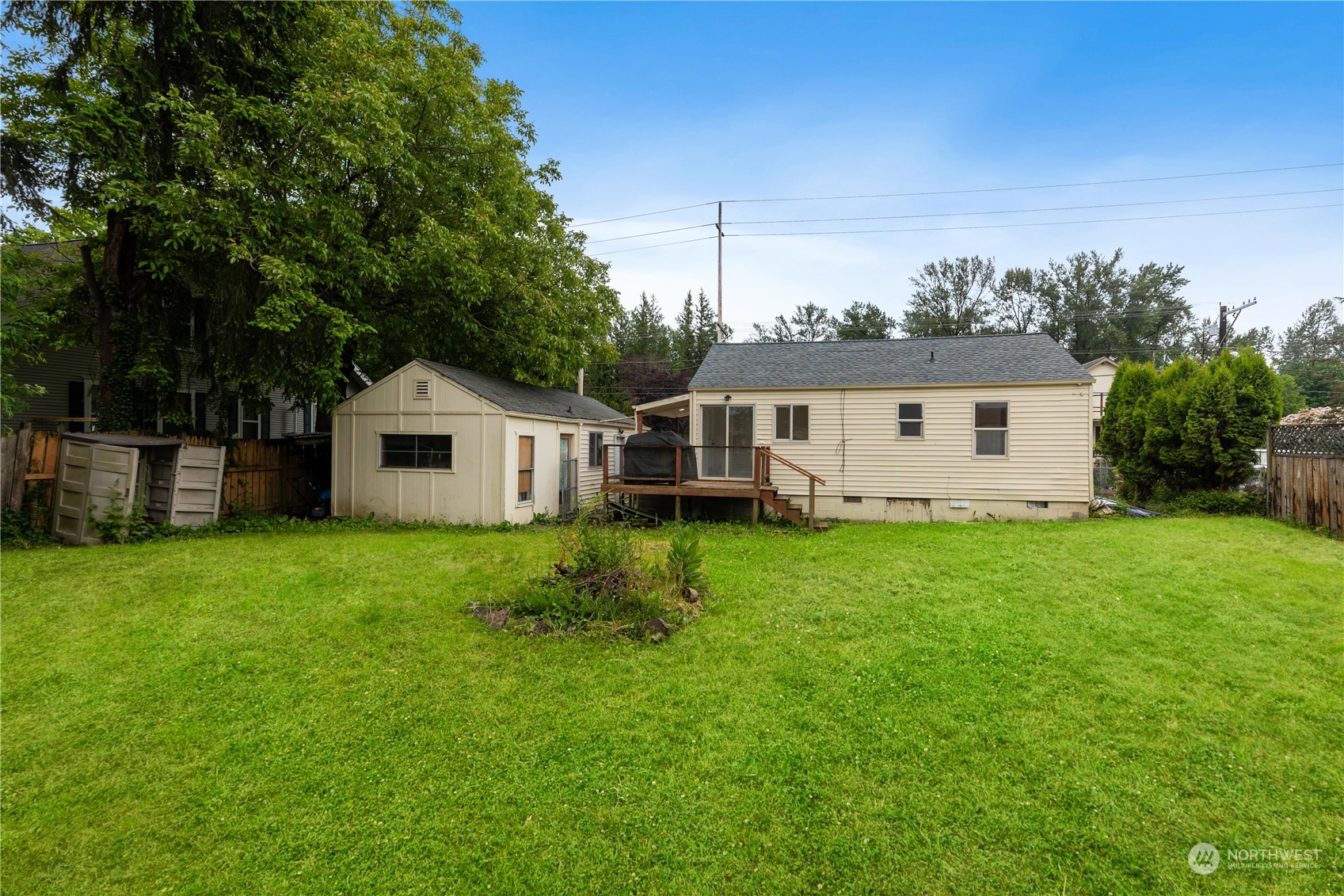 705 Main Street Sultan, WA 98294 - Photo 23 of 31 a house view with a garden space