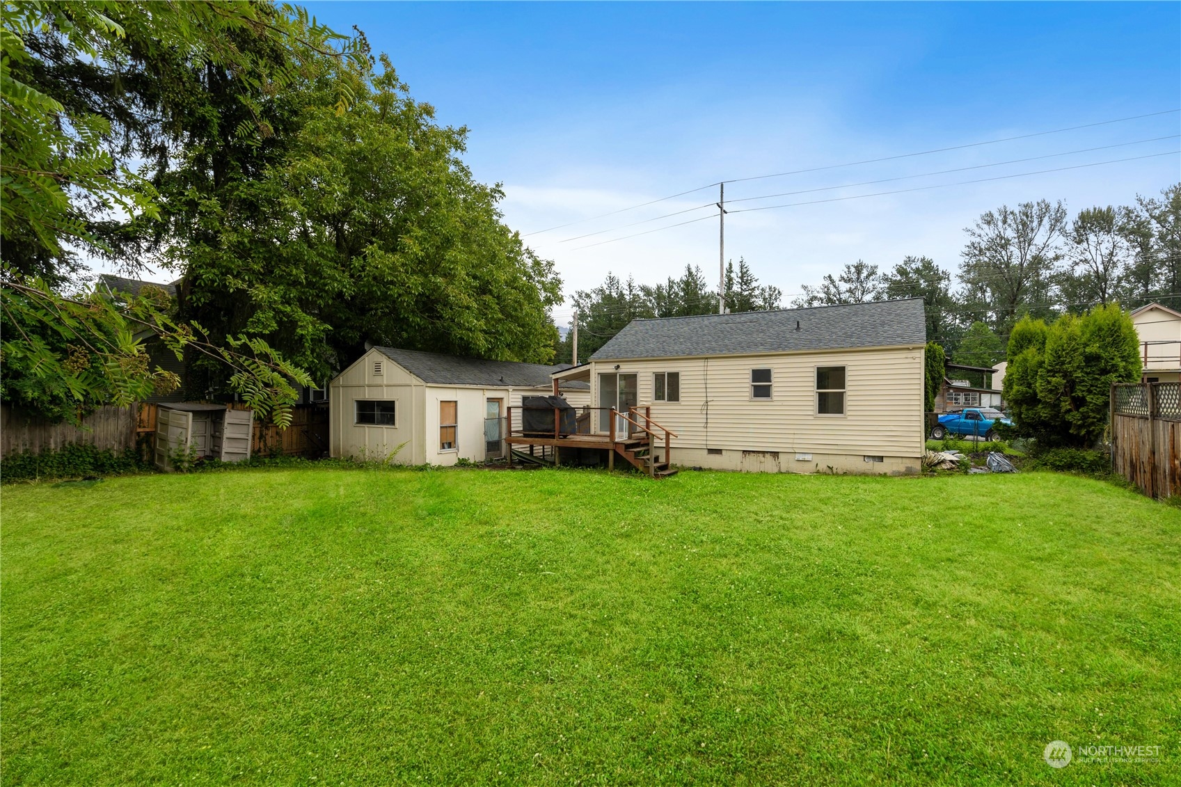 705 Main Street Sultan, WA 98294 - Photo 24 of 31 a front view of house with yard and trees