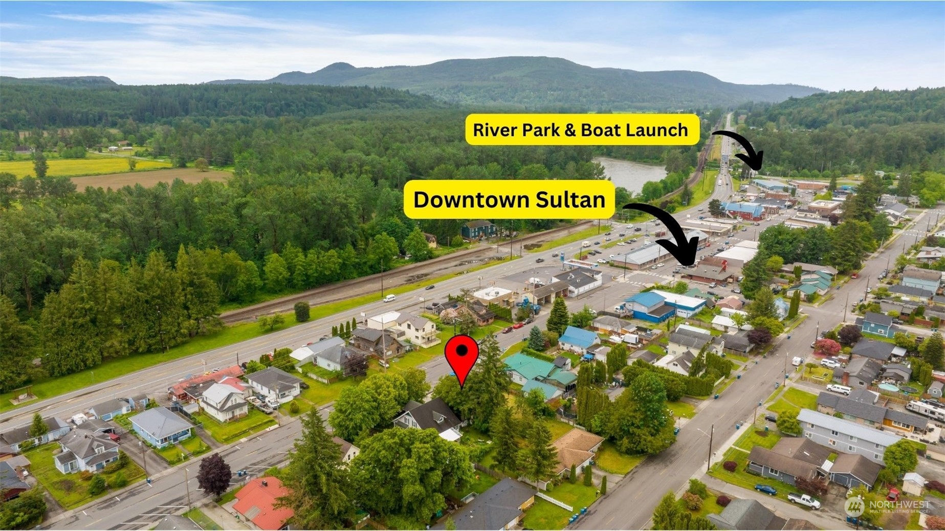 705 Main Street Sultan, WA 98294 - Photo 26 of 31 a sign that is on the side of a building