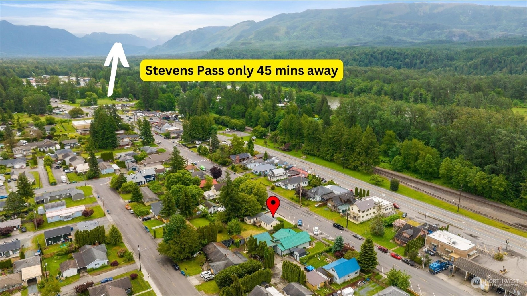 705 Main Street Sultan, WA 98294 - Photo 27 of 31 a sign that is on a brick wall