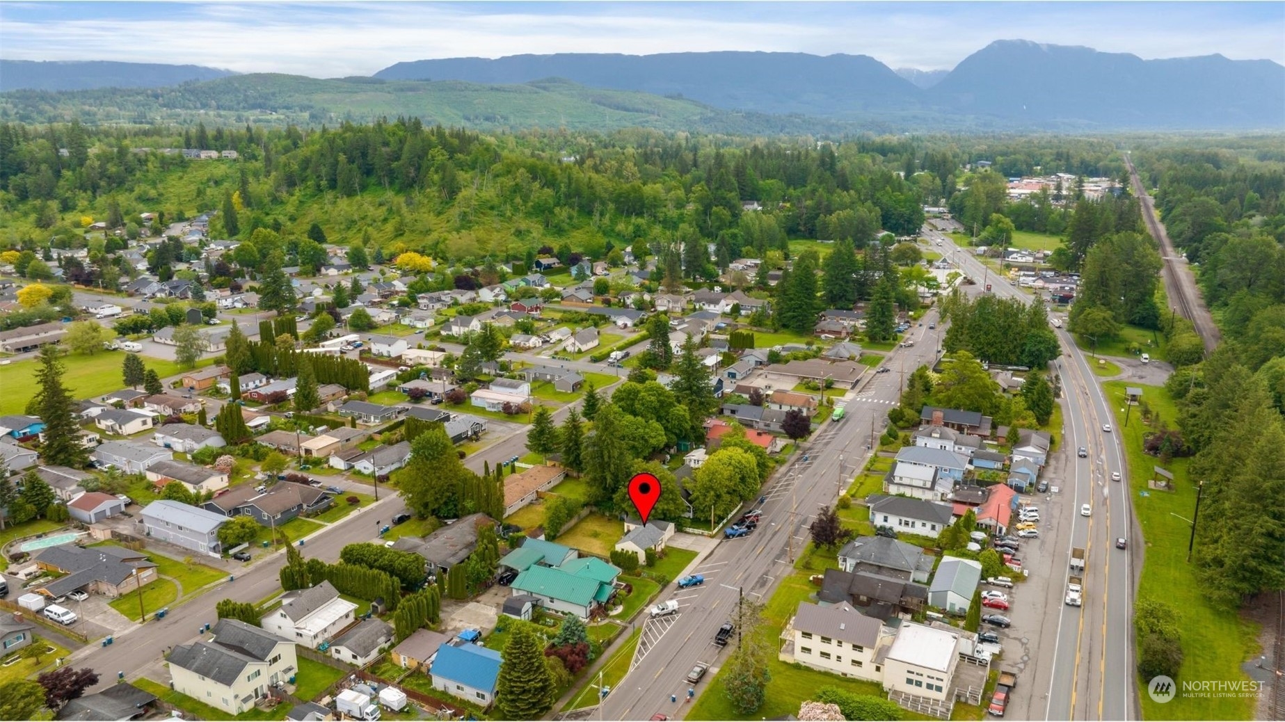 705 Main Street Sultan, WA 98294 - Photo 30 of 31 a view of a city with mountain