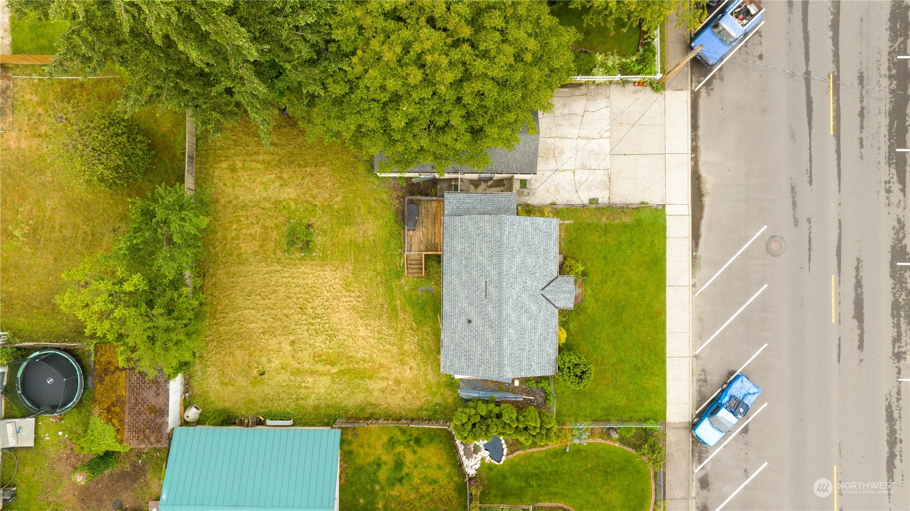 705 Main Street Sultan, WA 98294 - Photo 4 of 31 an aerial view of residential house with pool and yard
