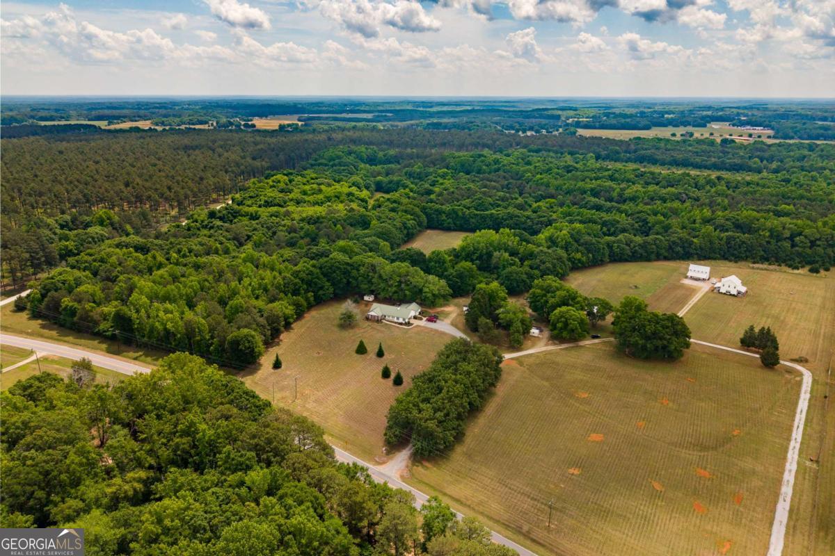 6.04-acres Old Bishop Road Bishop, GA 30621 - Photo 6 of 30 an aerial view of a houses with a yard