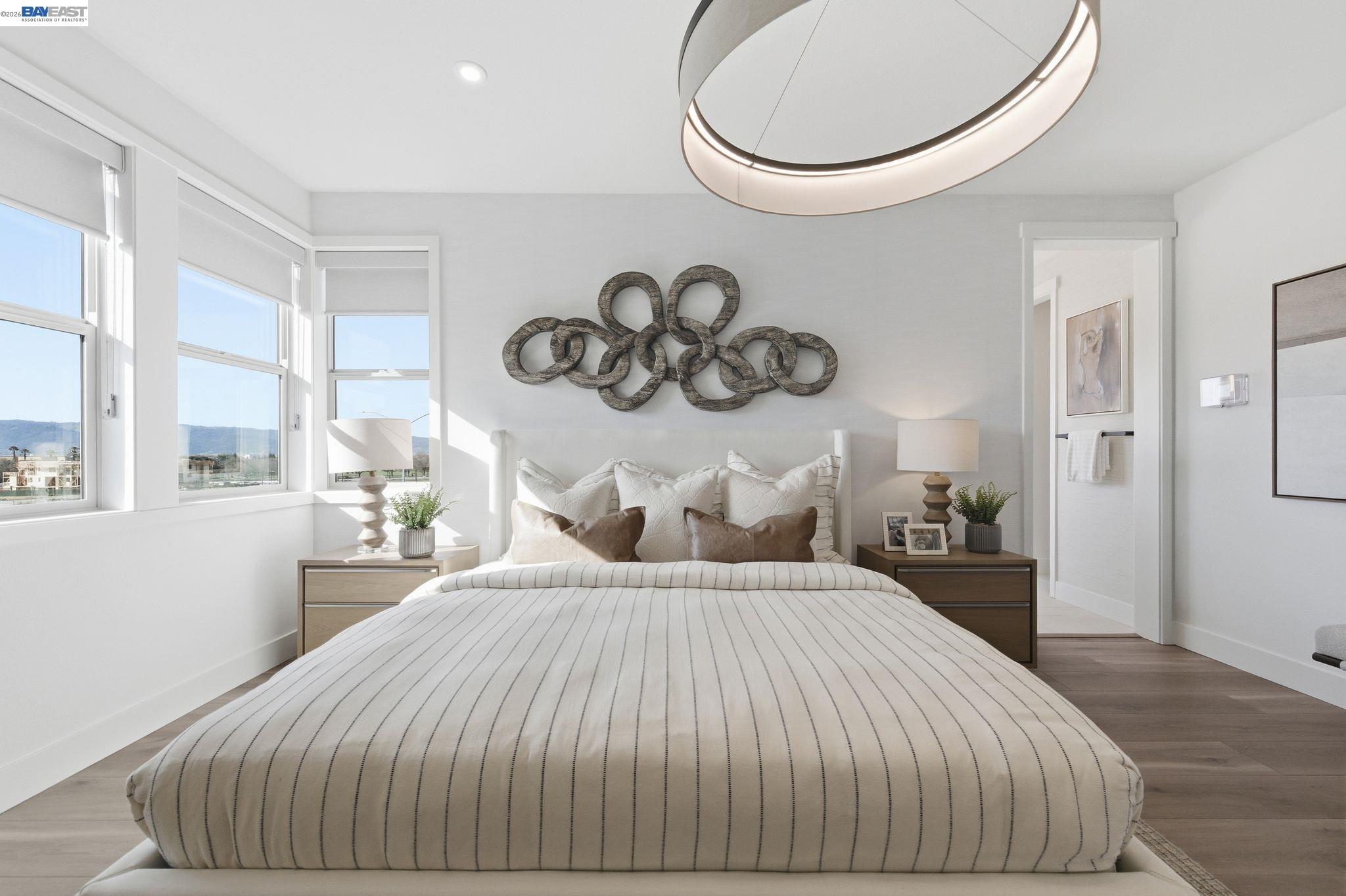 3952 Viggo Way Dublin, CA 94568 - Photo 24 of 39 a bedroom with a bed and a painting on the wall