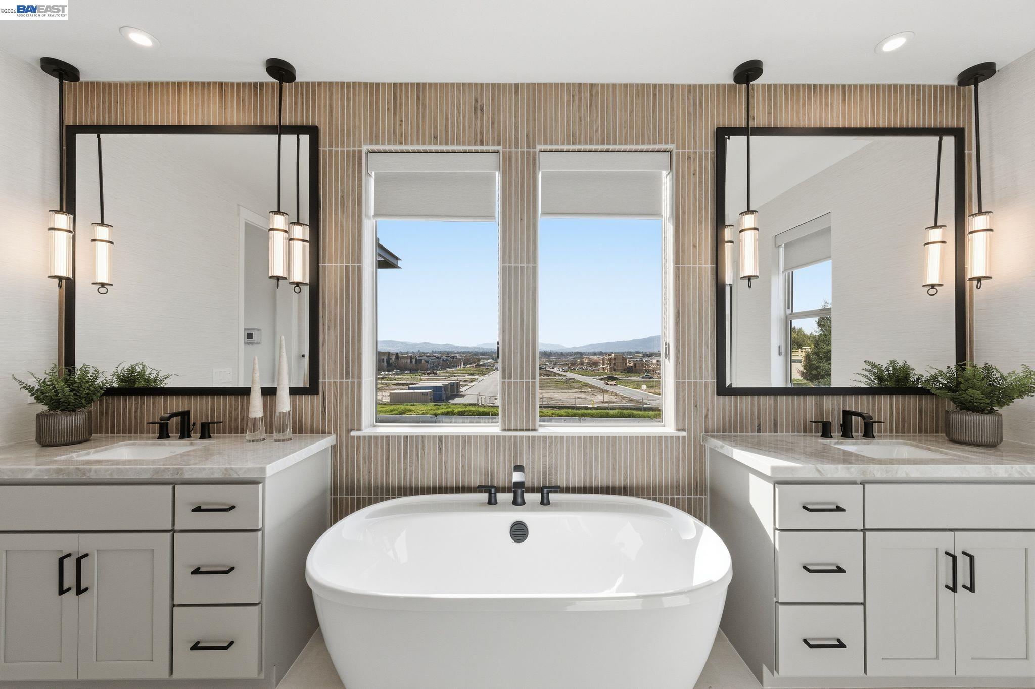 3952 Viggo Way Dublin, CA 94568 - Photo 27 of 39 a bathroom with a sink and a mirror
