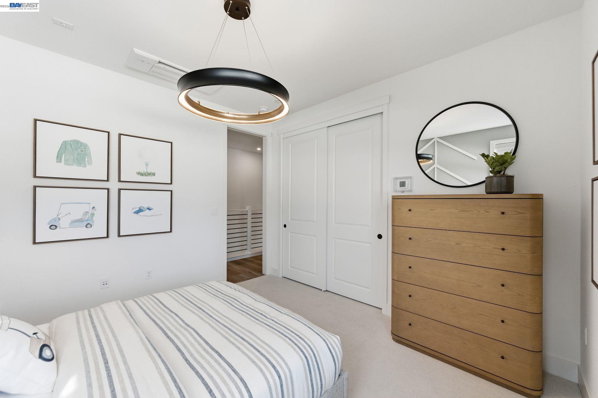 3952 Viggo Way Dublin, CA 94568 - Photo 30 of 39 a bedroom with a bed and a closet