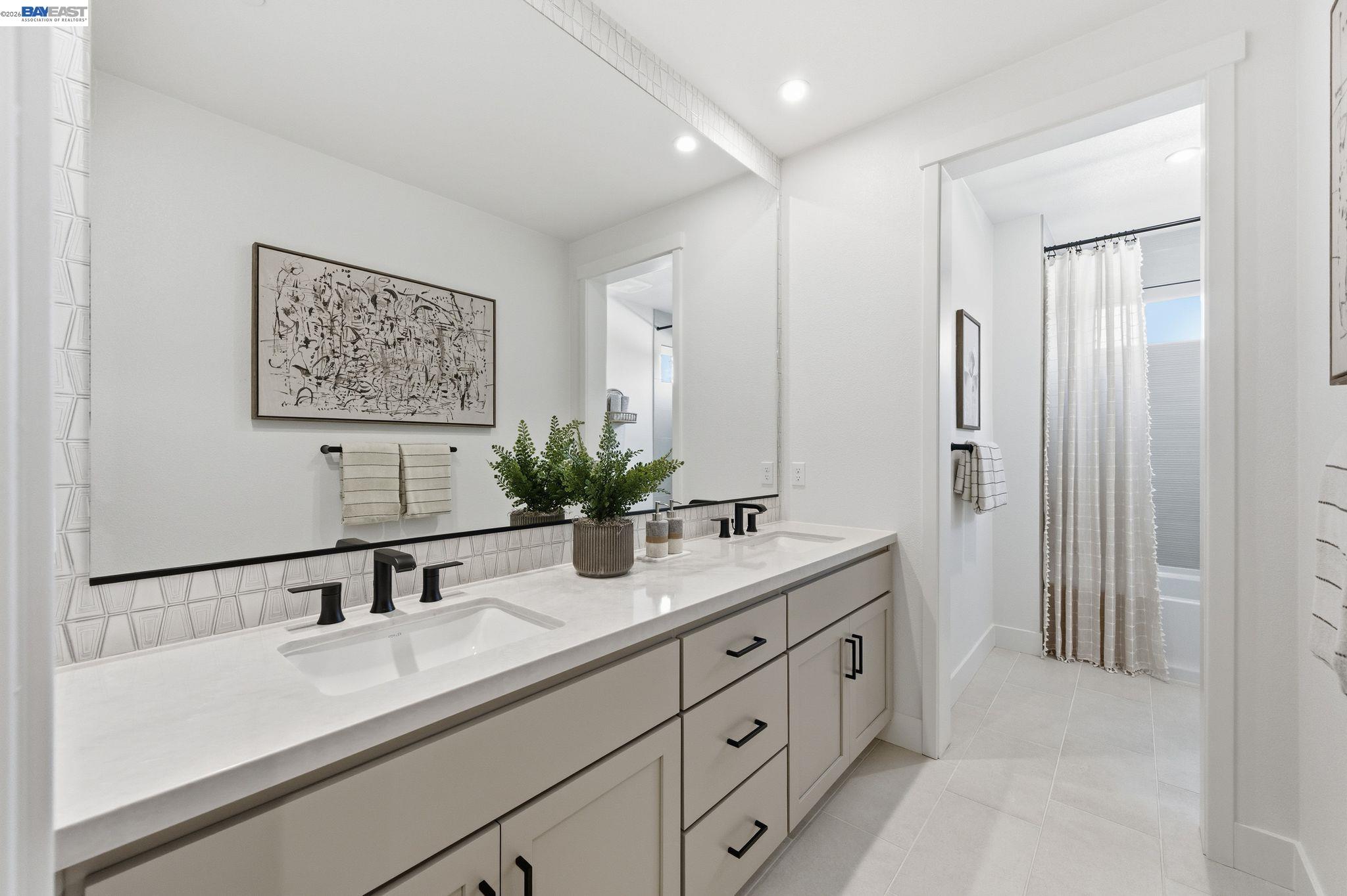 3952 Viggo Way Dublin, CA 94568 - Photo 31 of 39 a bathroom with a double vanity sink mirror and