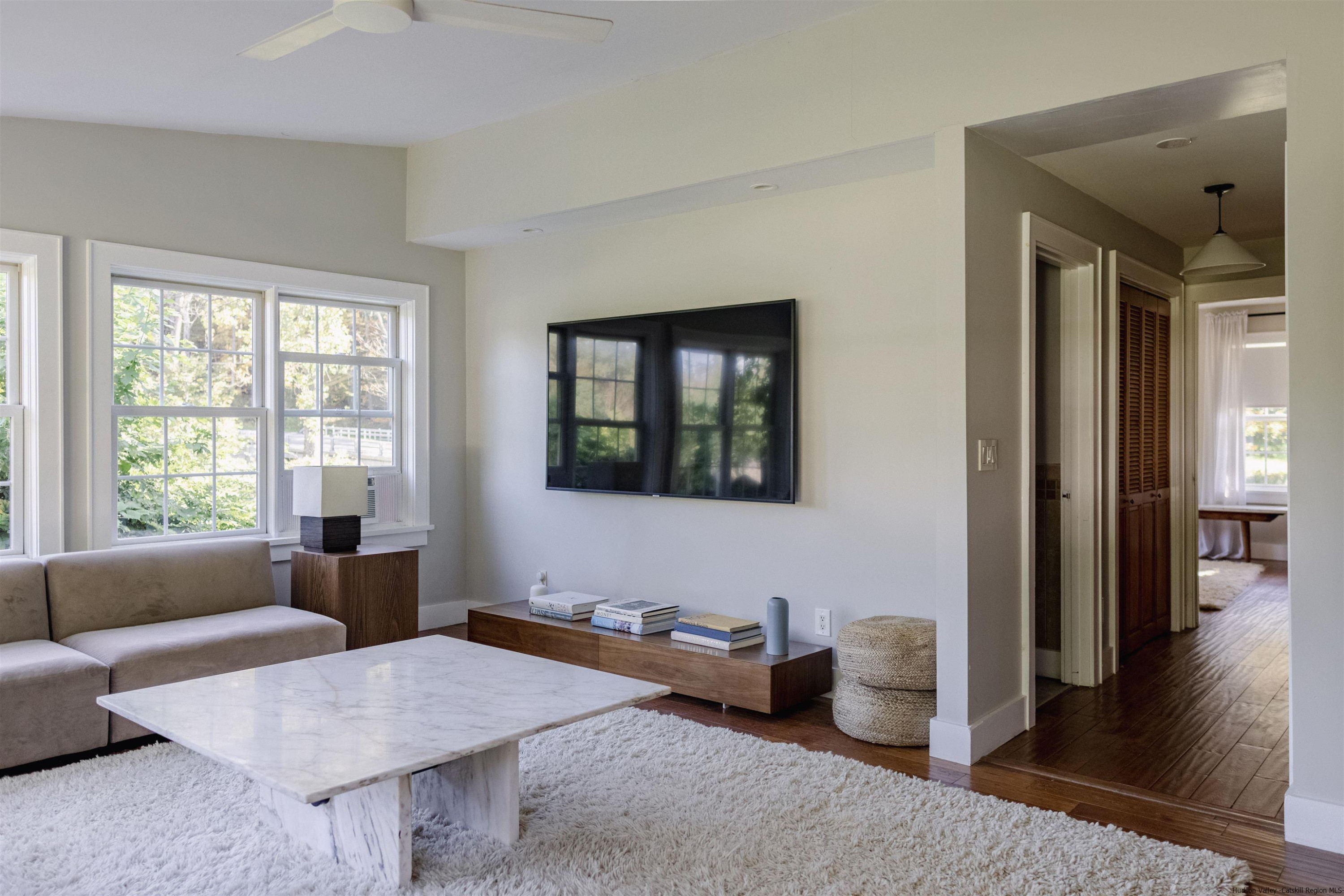 2814 County Road Cornwallville, NY 12418 - Photo 13 of 34 a living room with furniture and a window