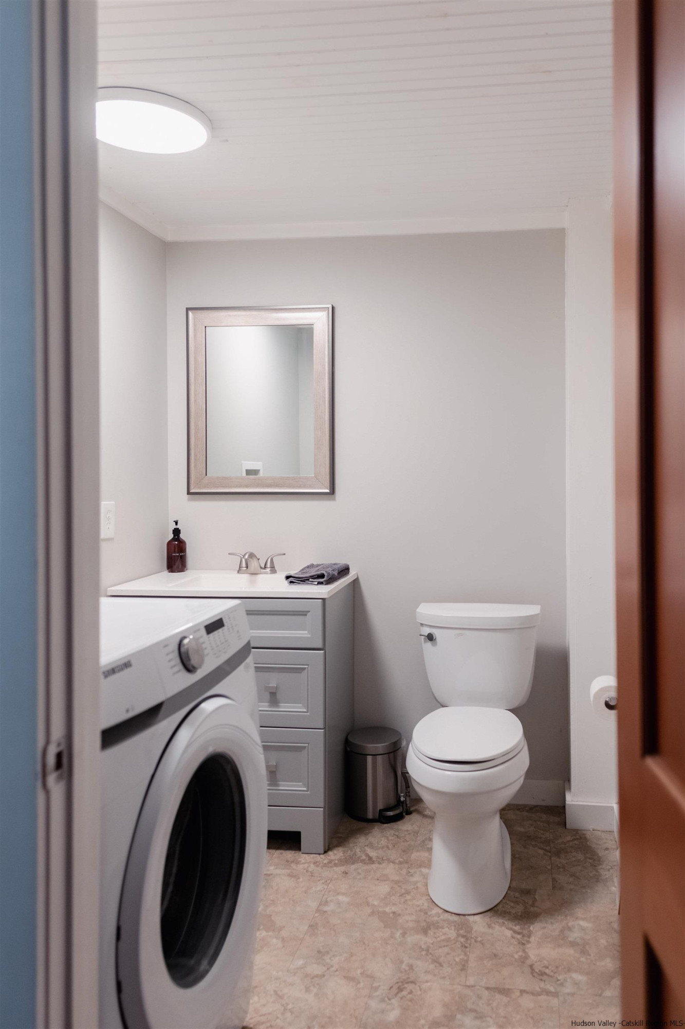 2814 County Road Cornwallville, NY 12418 - Photo 25 of 34 a bathroom with a toilet sink and mirror