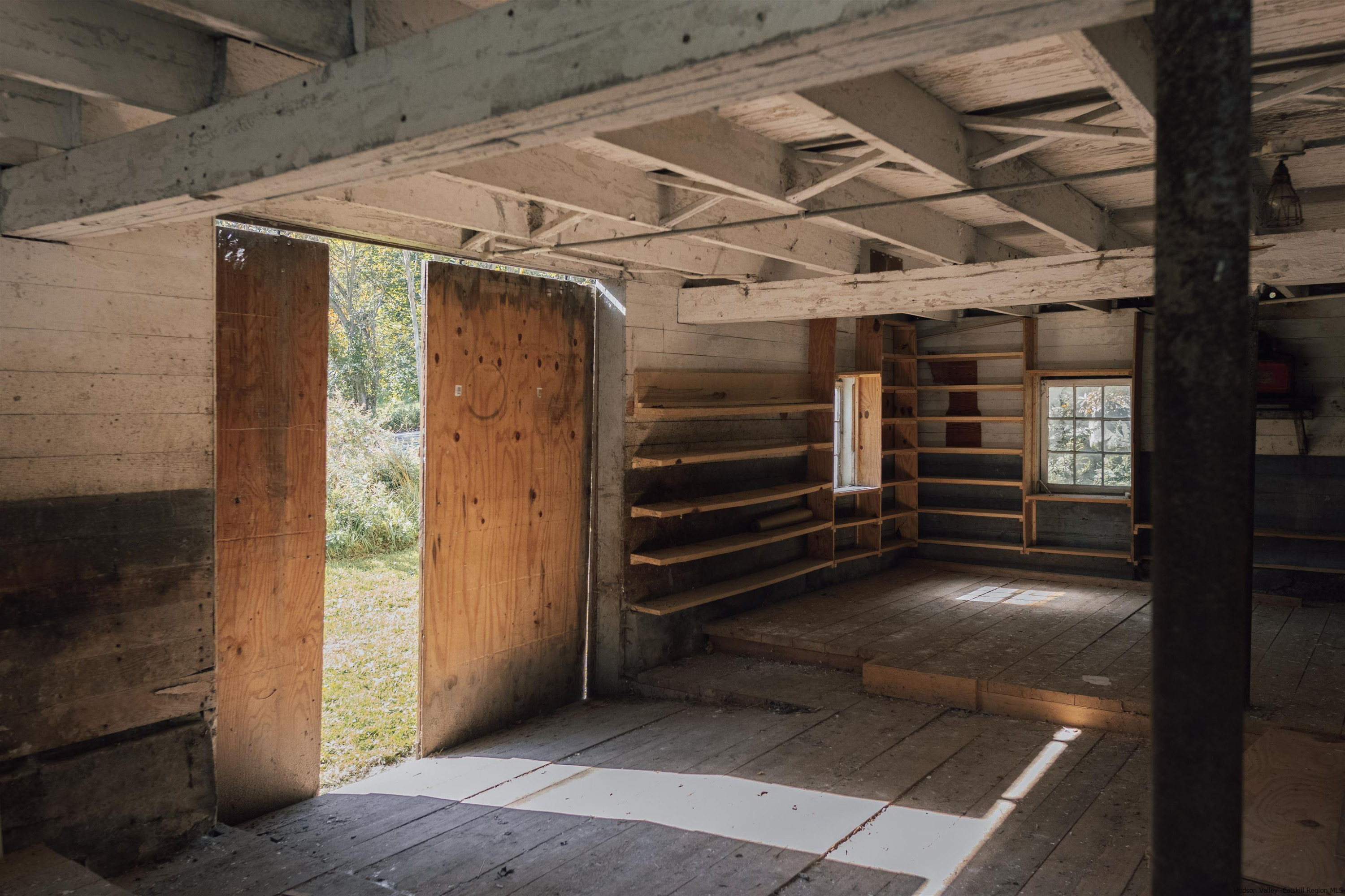 2814 County Road Cornwallville, NY 12418 - Photo 31 of 34 a view of an empty room with a fireplace