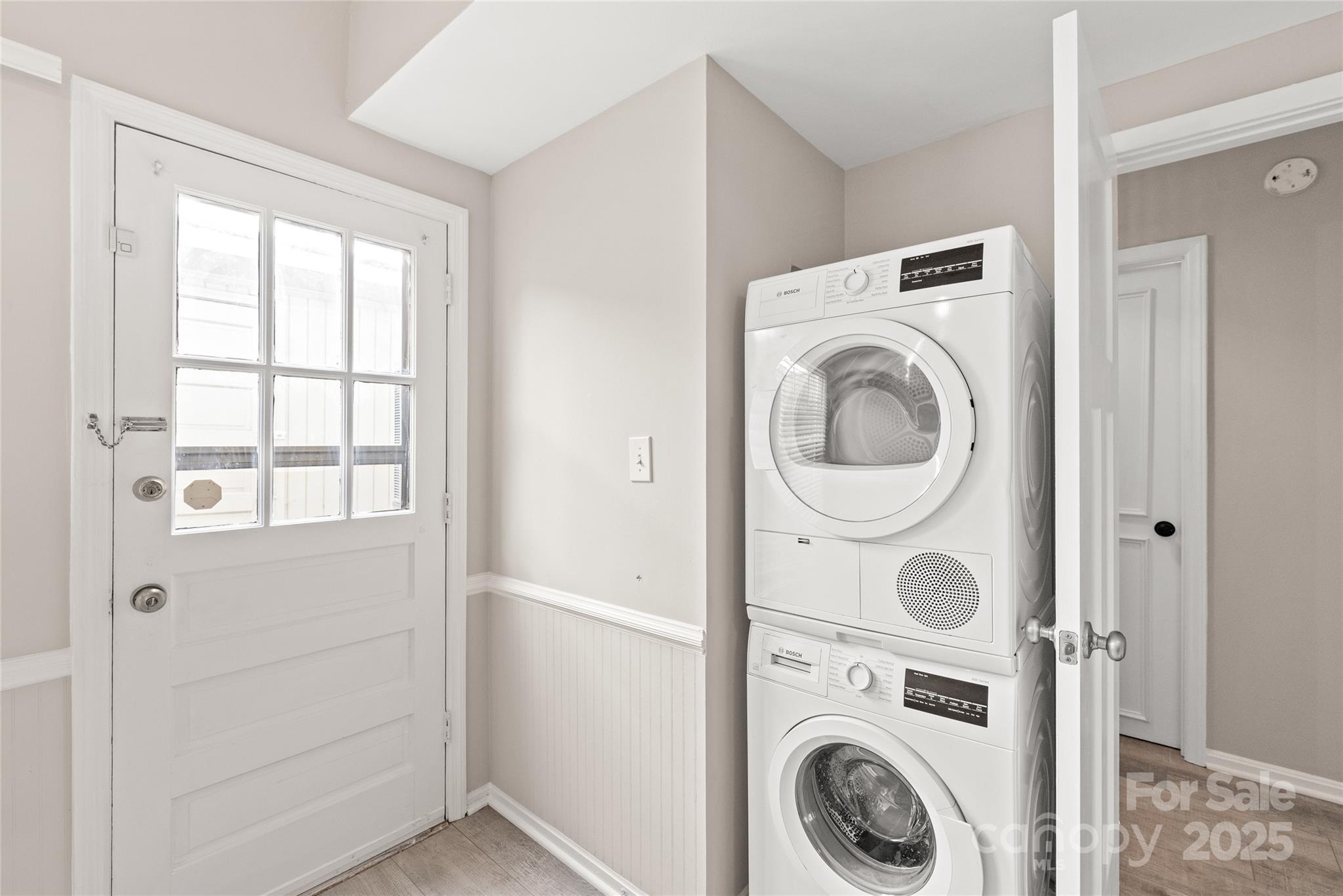 5949 Quail Hollow Road, Unit E Charlotte, NC 28210 - Photo 15 of 27 a utility room with dryer and washer